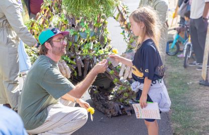Dandelion Man and kid with wishes good photo.jpg